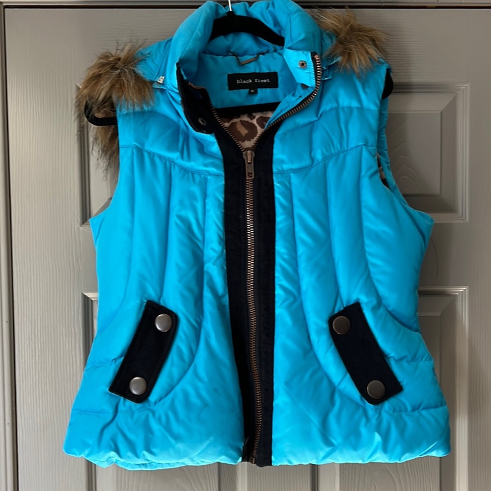 Black Rivet, vest, size XL. Pet and smoke free home.